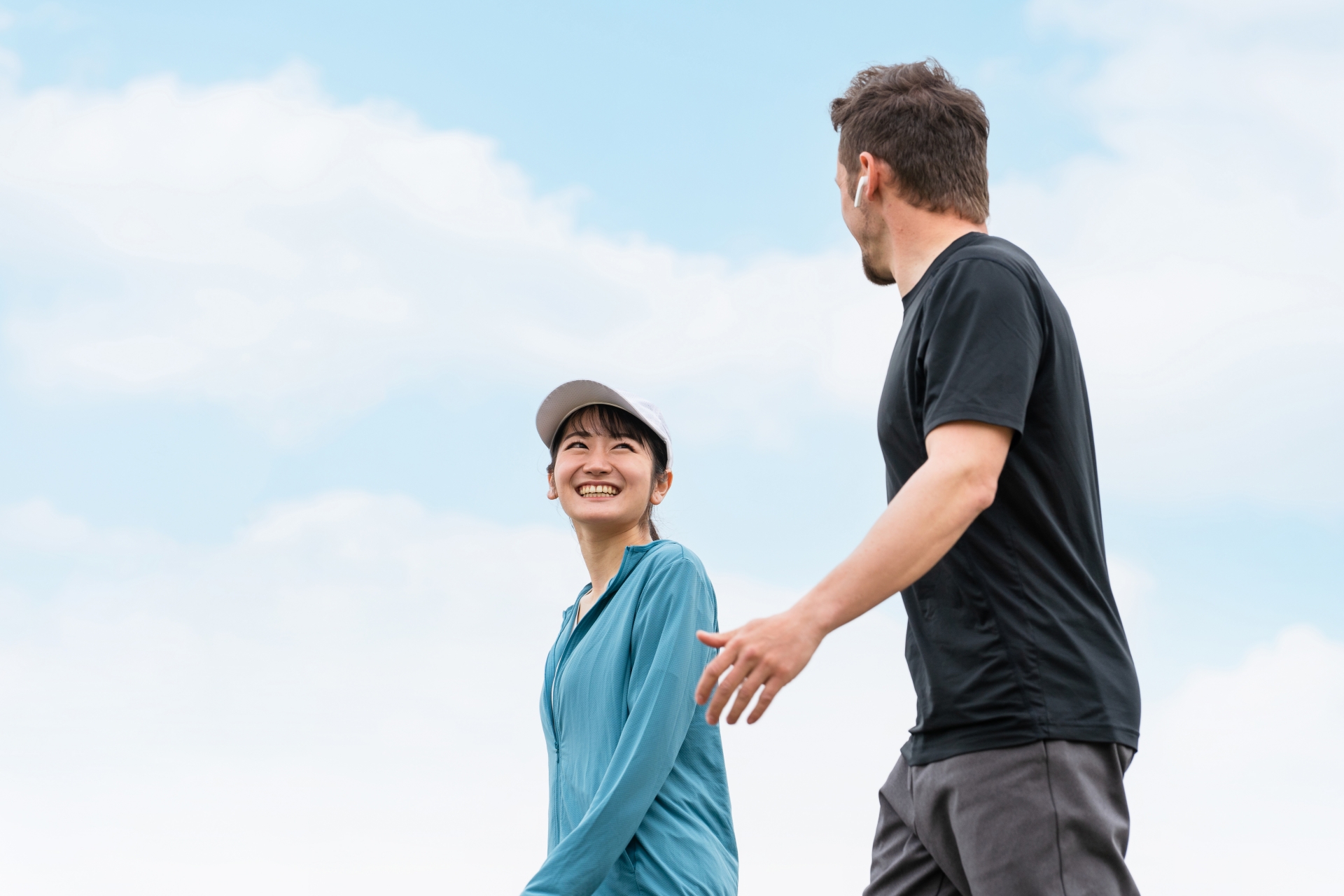 International golfers teeing off and enjoying the golf experience at Fuji Classic in Japan.